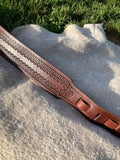 Boarder stamped guitar strap