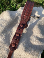 Boarder stamped guitar strap